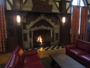 Delta Delta Chapter House Great Hall fireplace withlights