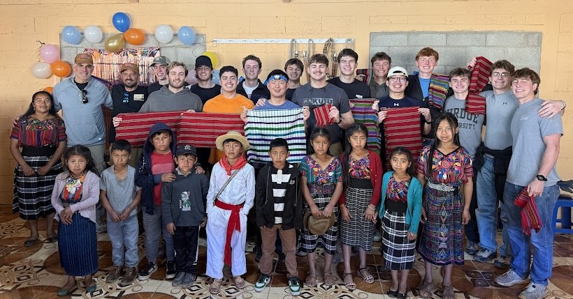 Sigs with Guatemalan children